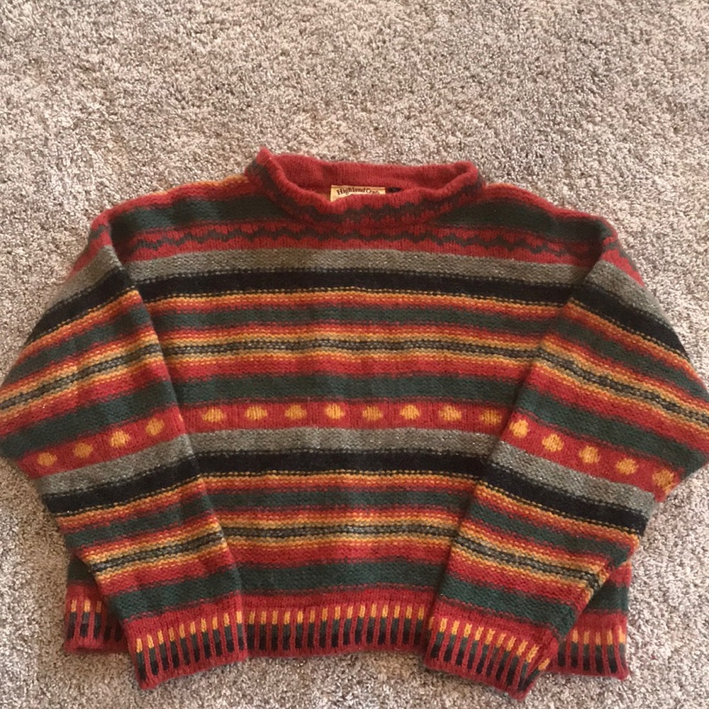 Red, orange, and green 100% wool sweater.
